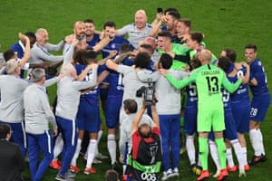 Chelsea’s players celebrate after the final whistle.