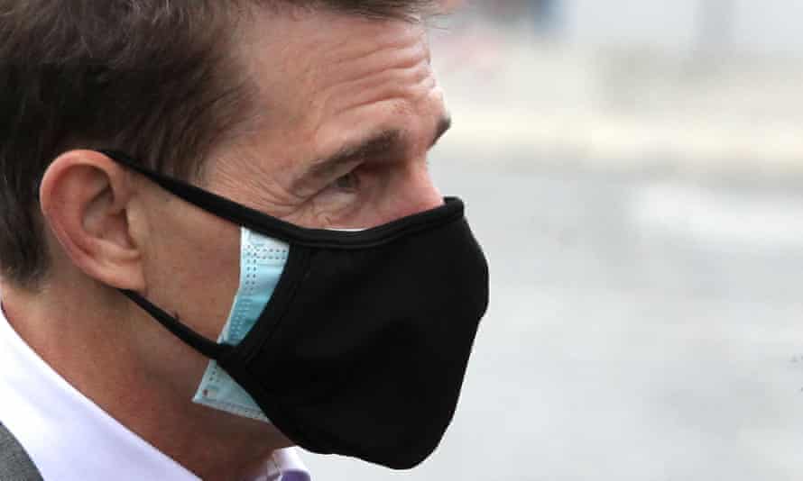 Tom Cruise wears two masks on set in Rome in November.