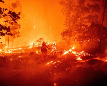 A firefighter surrounded by flames