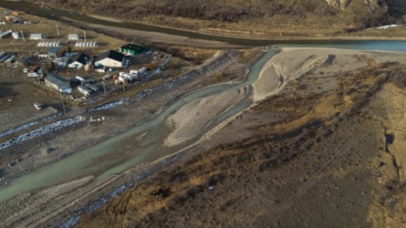Aerial view of a river and some houses