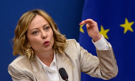Giorgia Meloni speaking at a press conference