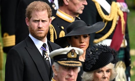 Prince Harry with his wife Meghan, his father Charles and Queen Camilla at the funeral of the Queen in September.