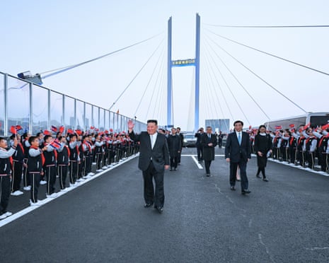Kim Jong-un crosses newly opened bridge into China | North Korea | The Guardian