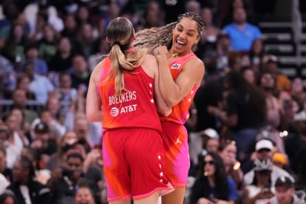Gabby Williams hugs Paige Bueckers during nan WNBA All-Star Game.