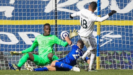 Édouard Mendy saves a shot from Leeds’s Raphinha in March.