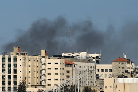 Smoke rises during an Israeli raid at al-Shifa hospital and the area around it on Thursday.
