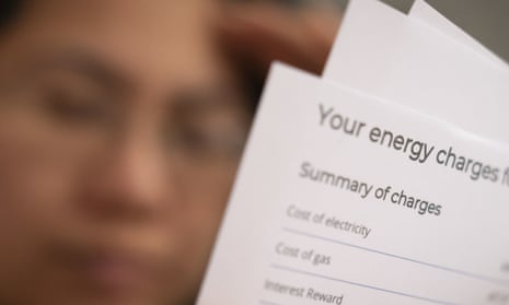 person looking at energy bills