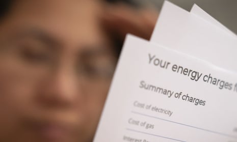 Person reads energy bill