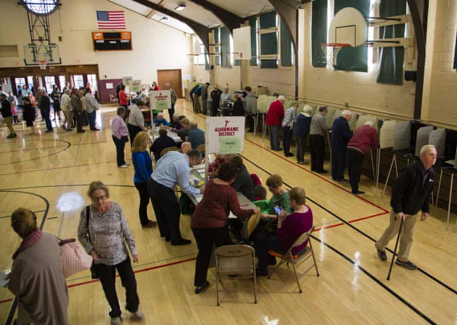 Voters at the Cedarburg community center, in Milwaukee, Wisconsin. Trump has racked up reportedly disproportionate votes in counties using electronic voting.