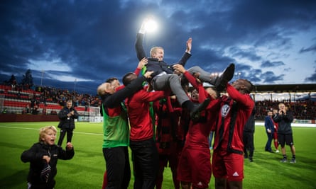 Graham Potter is held aloft by his Östersund players following their Europa League qualifying victory over round PAOK at the Jämtkraft Arena in August.