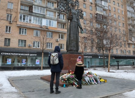 In Moscow, people lay flowers at a monument to Ukrainian poet and writer Larisa Kosach-Kvitka, known by her pen name Lesya Ukrainka, in memory of the victims of the Russian missile strike on an apartment block in Dnipro.