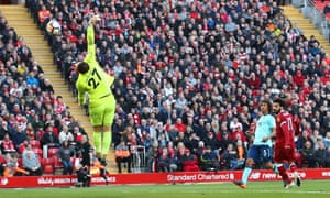 Salah heads the ball over Bournemouth’s Asmir Begovic.
