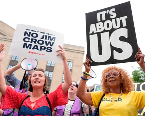 Protesters hold signs during a rally against a special session of the Tennessee state legislature, 5 May 2026.