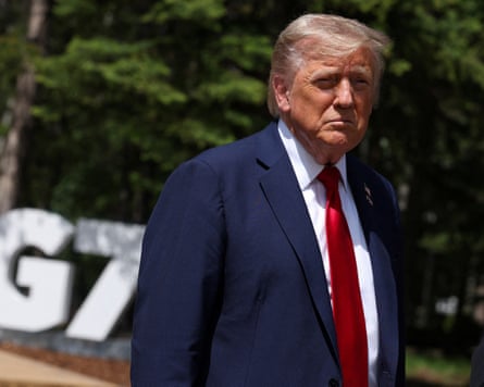 Donald Trump speaks to reporters at the G7 summit in Canada