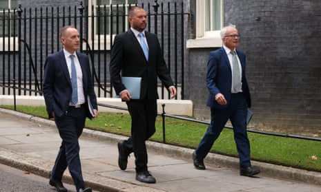 (L-R) Chair of the OBR, Office For Budget Responsibility, Richard Hughes, Member of the Budget Responsibility Committee, Andy King and Prof. David Miles CBE, Member of the Budget Responsibility Committee leave Downing Street after a meeting with British Prime Minister Liz Truss and her Chancellor Kwasi Kwarteng on September 30, 2022 in London, England.|465x278.9054878048781