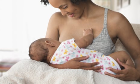 Women breastfeeding baby