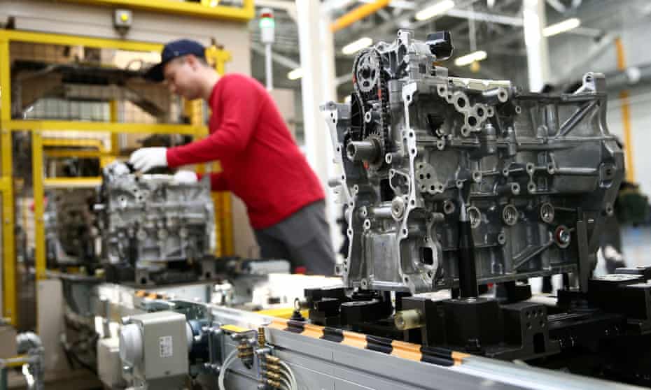 A worker assembling a car engine at a production line in Vladivostok in 2018