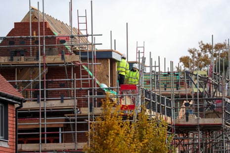 Builders working on new build homes.