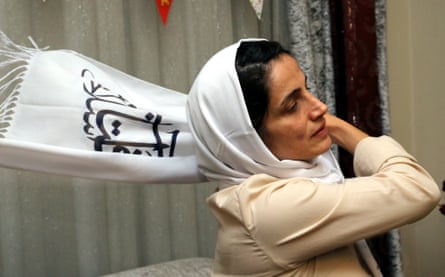 Nasrin Sotoudeh adjusts her headscarf