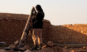 An Isis fighter in Raqqa Images, from Isis propaganda footage.