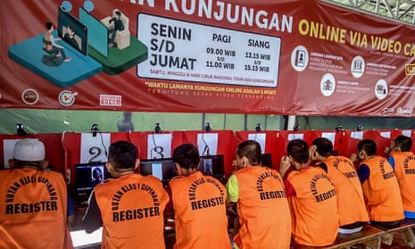 Inmates receive online calls from their families in prison in Jakarta