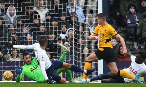 Leander Dendoncker shoots past Hugo Lloris to score Wolves’ second goal against Tottenham