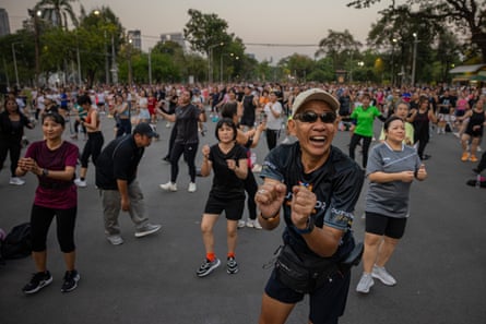People take part in a mass aerobics session
