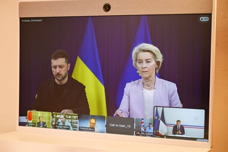 European Commission President Ursula von der Leyen and Ukraine’s President Volodymyr Zelenskyy appear on a screen during the “coalition of the willing” video conference.