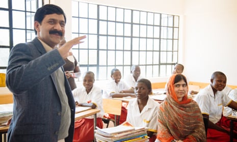 Yousafzai and his daughter Malala visit a school in Kenya as part of their work with the Malala Fund.