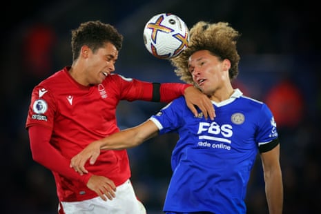 Wout Faes of Leicester City (right) goes up for a header with Brennan Johnson of Nottingham Forest.