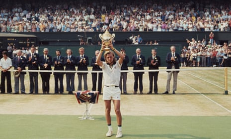 Bjorn Borg holds the Wimbledon trophy aloft after defeating Ilie Nastase of Romania for his first of five successive wins in 1976.