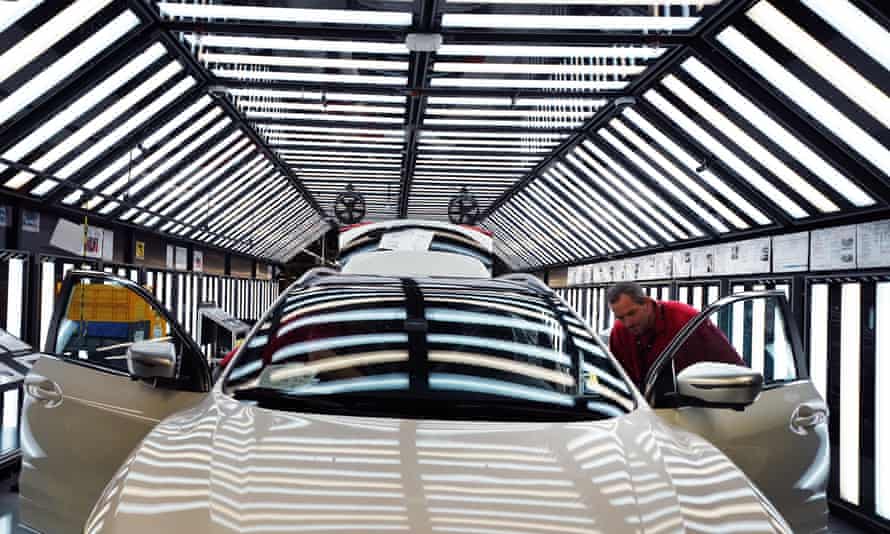 Workers on the production line at Nissan's factory in Sunderland