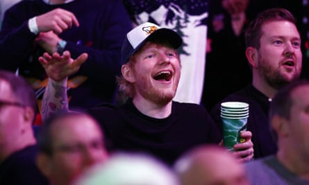 Ed Sheeran enjoys the party at Alexandra Palace.