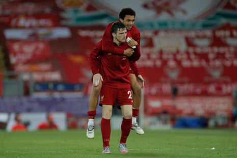 Liverpool’s Andrew Roberton and Trent Alexander-Arnold (top) celebrate at full time.