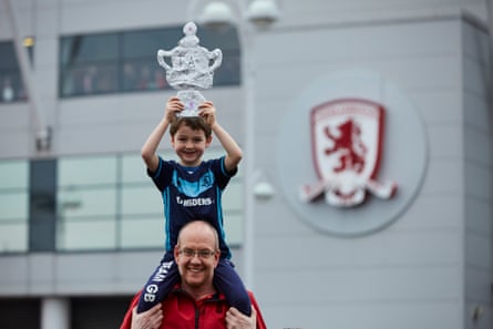 Mark Sainsbury and six year son George with their tin foil FA Cup.