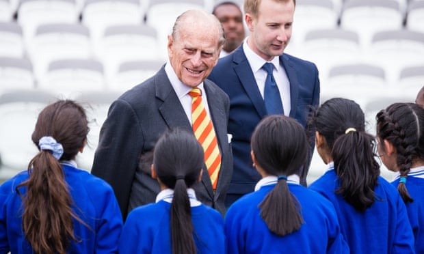 Prince Philip meets pupils from St Edward’s Catholic primary school in London. He has announced he will be stepping down from royal duties in September.