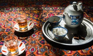Tea set on a carpet, in Iran.