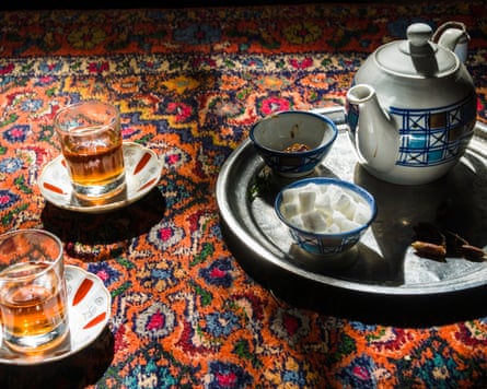 Teacup set on a carpet.