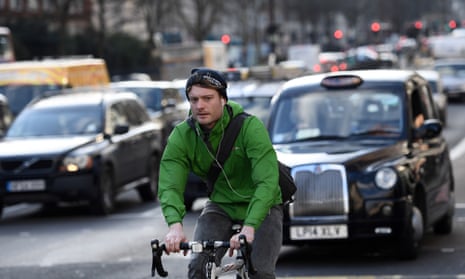Cyclist riding along Marylebone Road in London