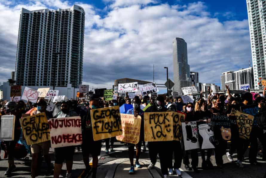 Protesters march in downtown Miami in June 2020 during a protest over the death of George Floyd.