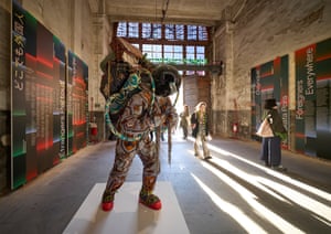 Artwork inside the main Arsenale exhibition space. Venice Biennale. Venice, Italy. Photograph by David Levene 21/4/24