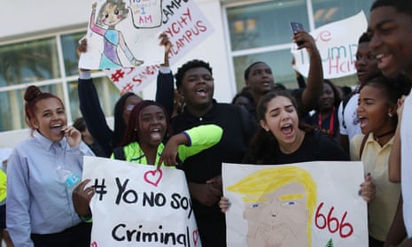 High school and college students rally against President-elect Donald Trump in Homestead, Florida. 
