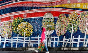 IRAN-DAILY LIFE<br>An Iranian woman walks past graffiti in Valiasr Street in northern Tehran on May 8, 2019. (Photo by ATTA KENARE / AFP)ATTA KENARE/AFP/Getty Images