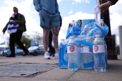 Arsenal-branded water bottles are on sale at the Etihad.