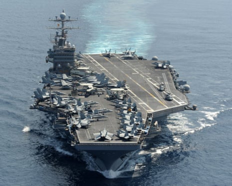 An aircraft carrier at sea.