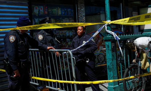 Police at the scene of the shooting on Tuesday. The NYPD did not identify the five people who will evenly split the reward.