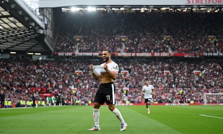Mohamed Salah celebrates scoring Liverpool’s third at Manchester United