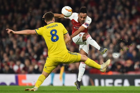Arsenal’s striker Pierre-Emerick Aubameyang attempts to break the stalemate but his shot isblocked by BATE Borisov’s Stanislav Dragun.