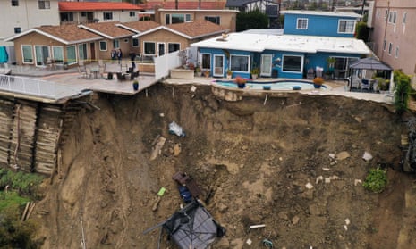 Oceanfront homes crumble in California as torrential rains lead to