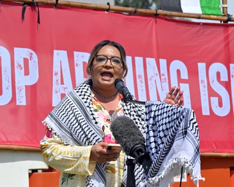 Greens senator Mehreen Faruqi addresses protesters outside Parliament House